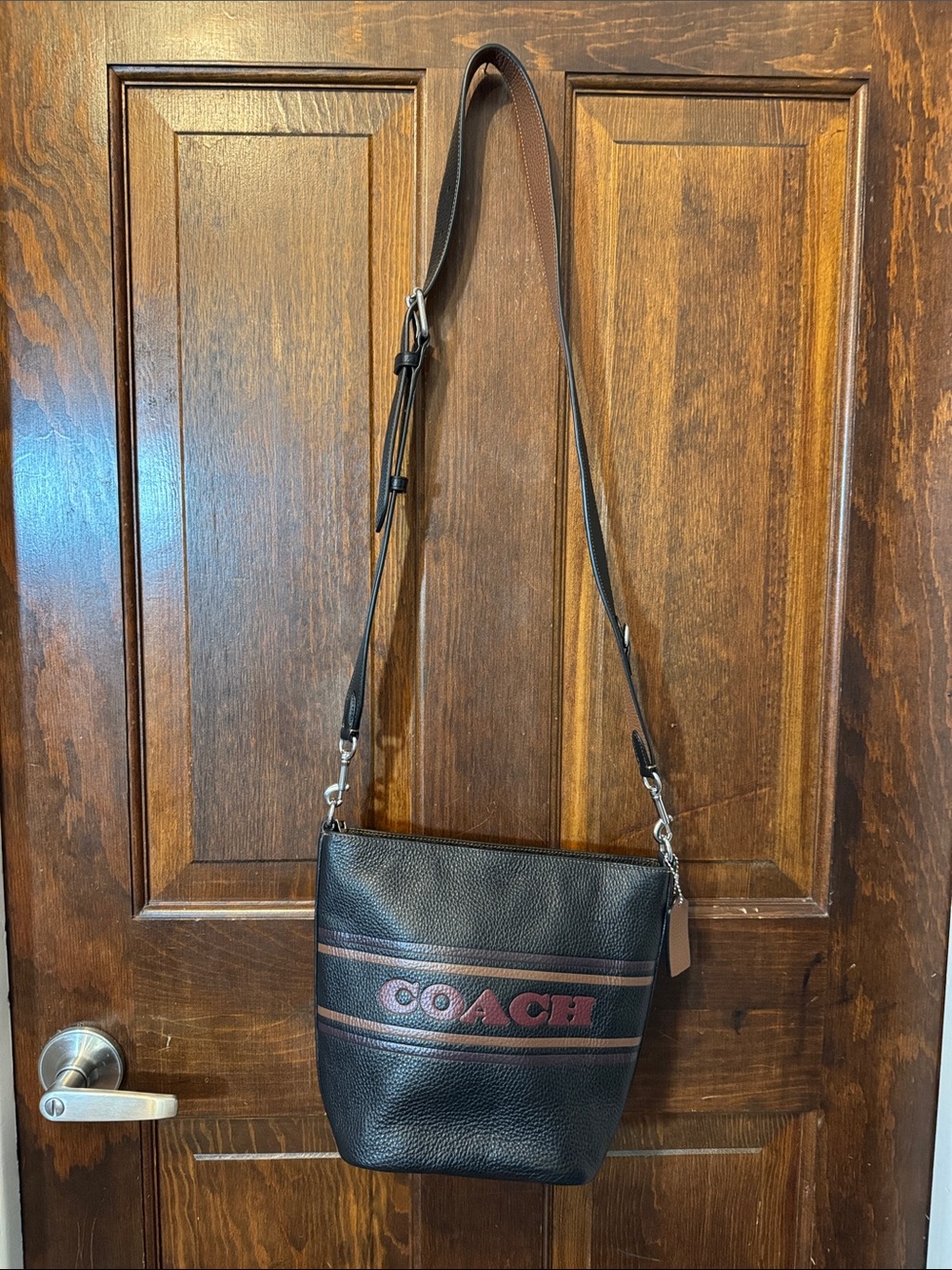 Coach Black Pebbled Leather Messenger Bag with Red Stripe